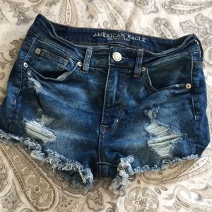Distressed denim cut-off shorts